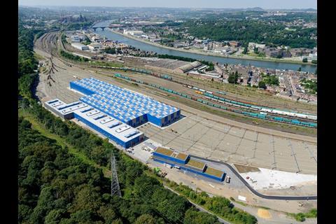 Aerial view of the new Kinkempois workshops, showing the remaining freight yards and the former wagon works closer to the River Meuse. (Photo: Bureau Greisch)